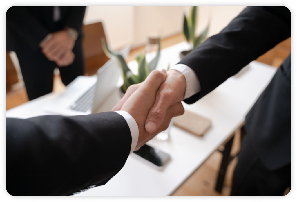 Business partners shaking hands